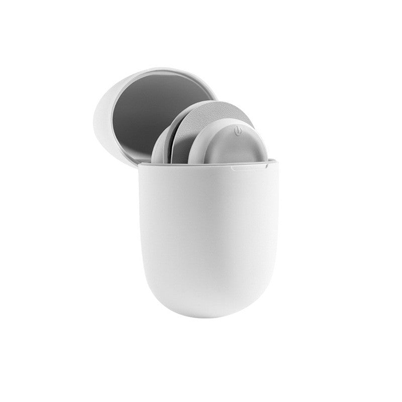 White ceramic cup with two gray lids on a white background